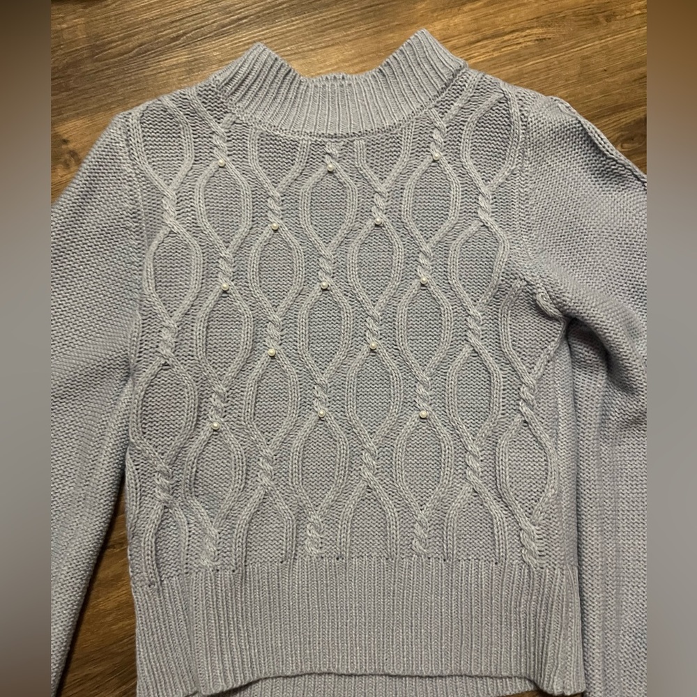 Blue sweater with pearls